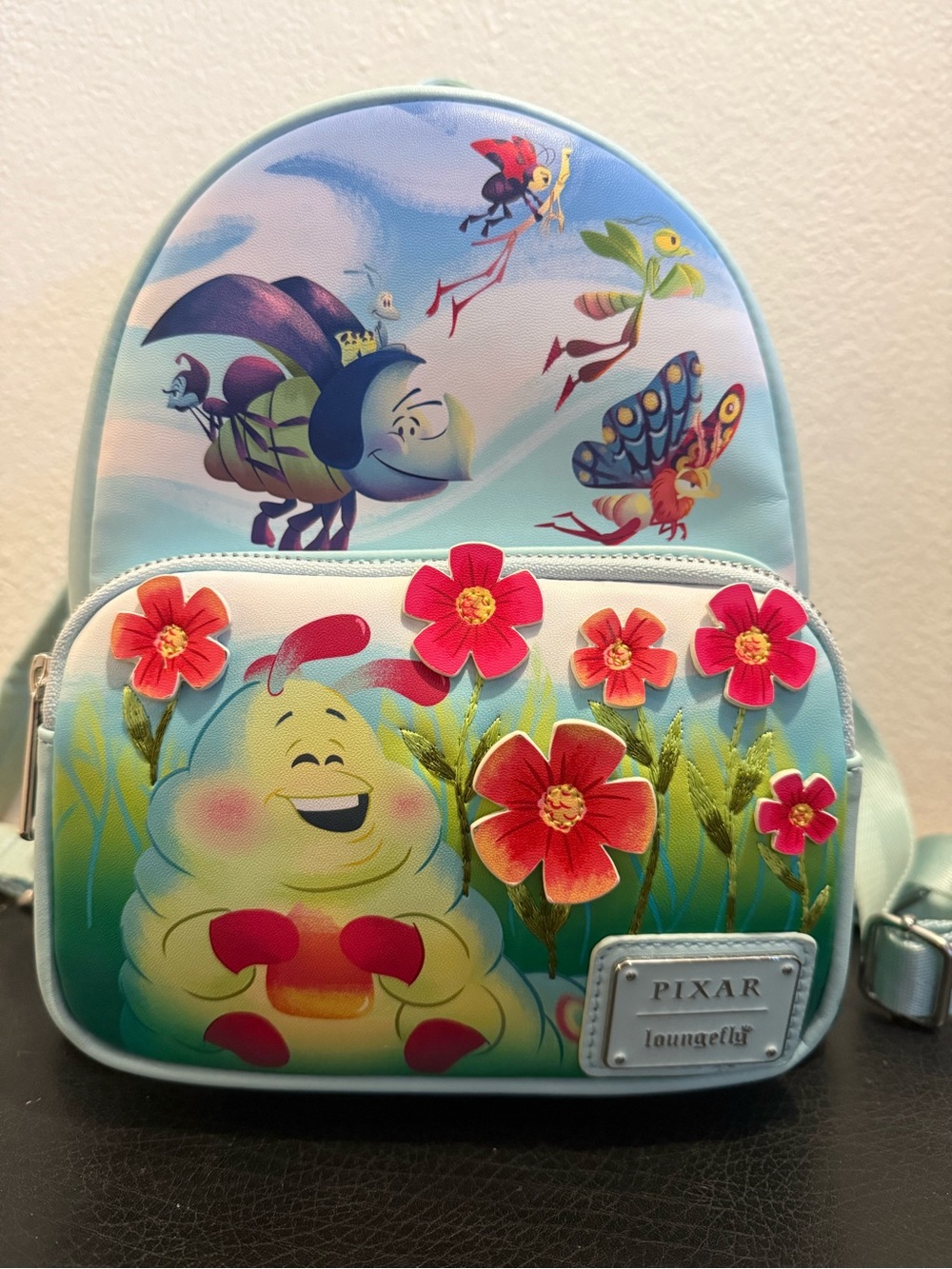 Loungefly Pixar Blue Caterpillar Floral Mini Backpack